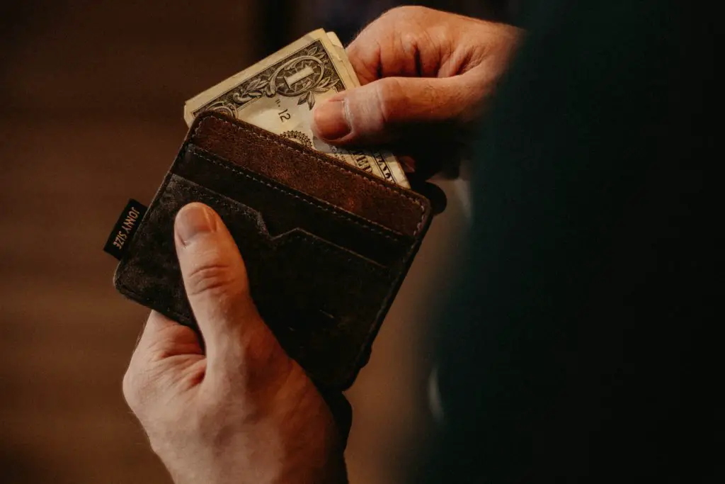 Putting money in a front wallet